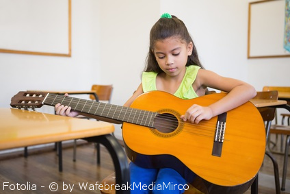 Too big guitar for a kid