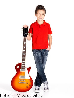 kid with an electric guitar